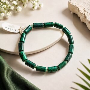 Natural Malachite Tube Beads Bracelet on a premium beige background – Handmade Green Healing Crystal Bracelet for Heart Chakra, Protection, Positive Energy, Reiki & Meditation.